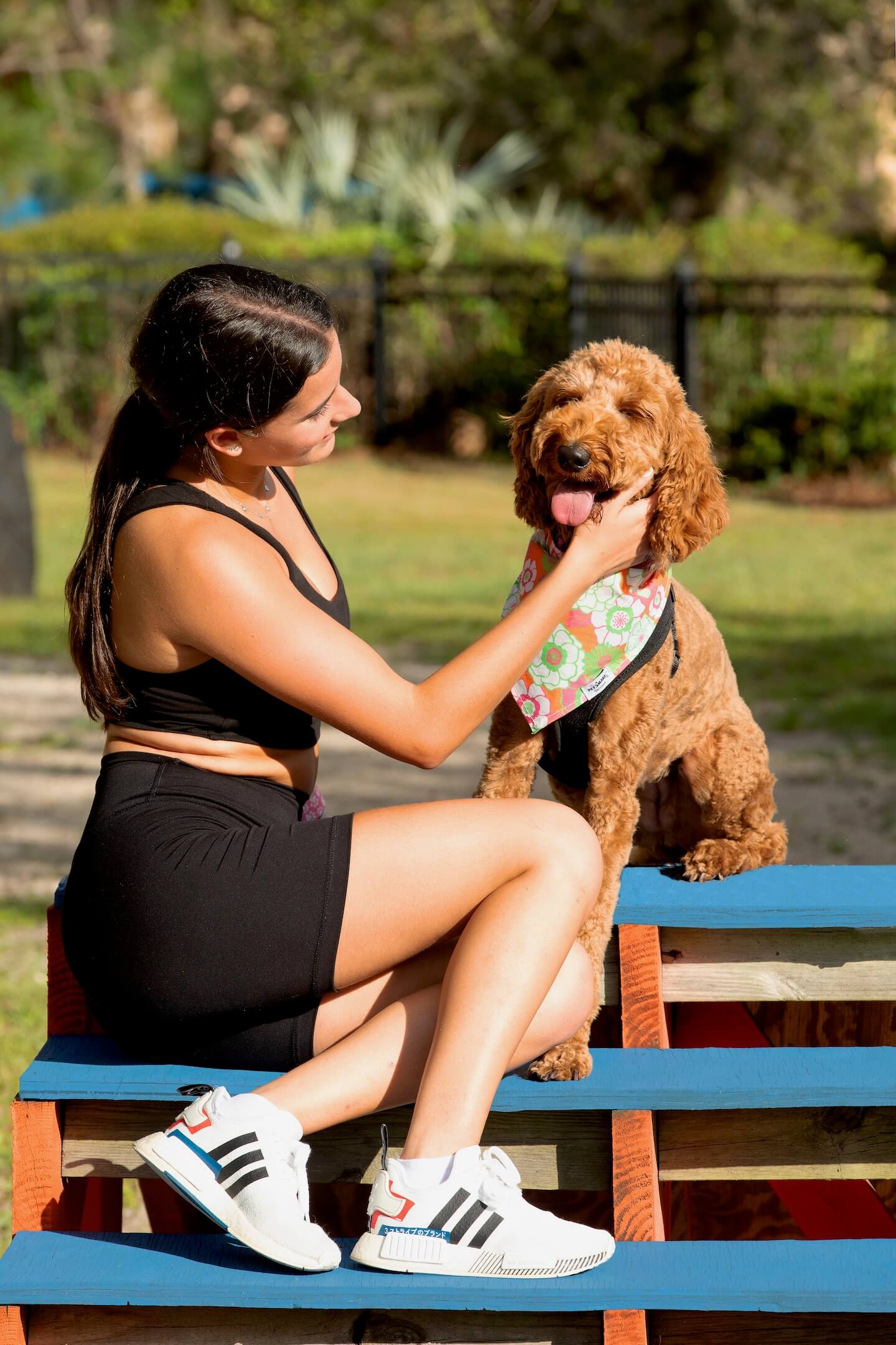 girl petting her dog